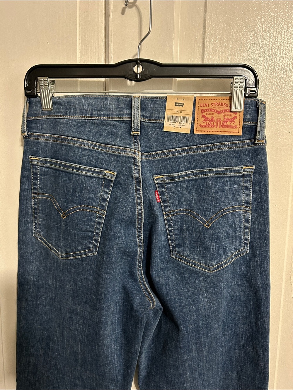 NET • Levi's 724 High Rise Slim Straight Jeans - Medium Blue - Picture 8 of 13